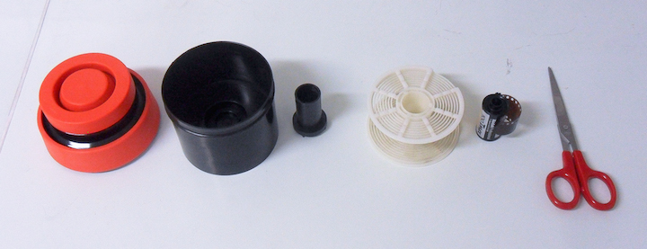 tanque espiral, filme e tesouras
